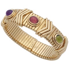 Bvlgari 1970s Cabochon Pink Tourmaline, Peridot and Amethyst Gold Cuff Bracelet