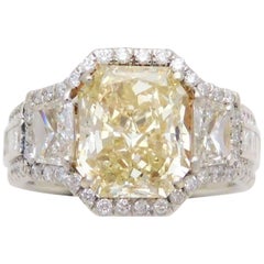 GIA Certified 7.57 Carat Handmade Radiant Cut Canary Yellow Diamond Ring