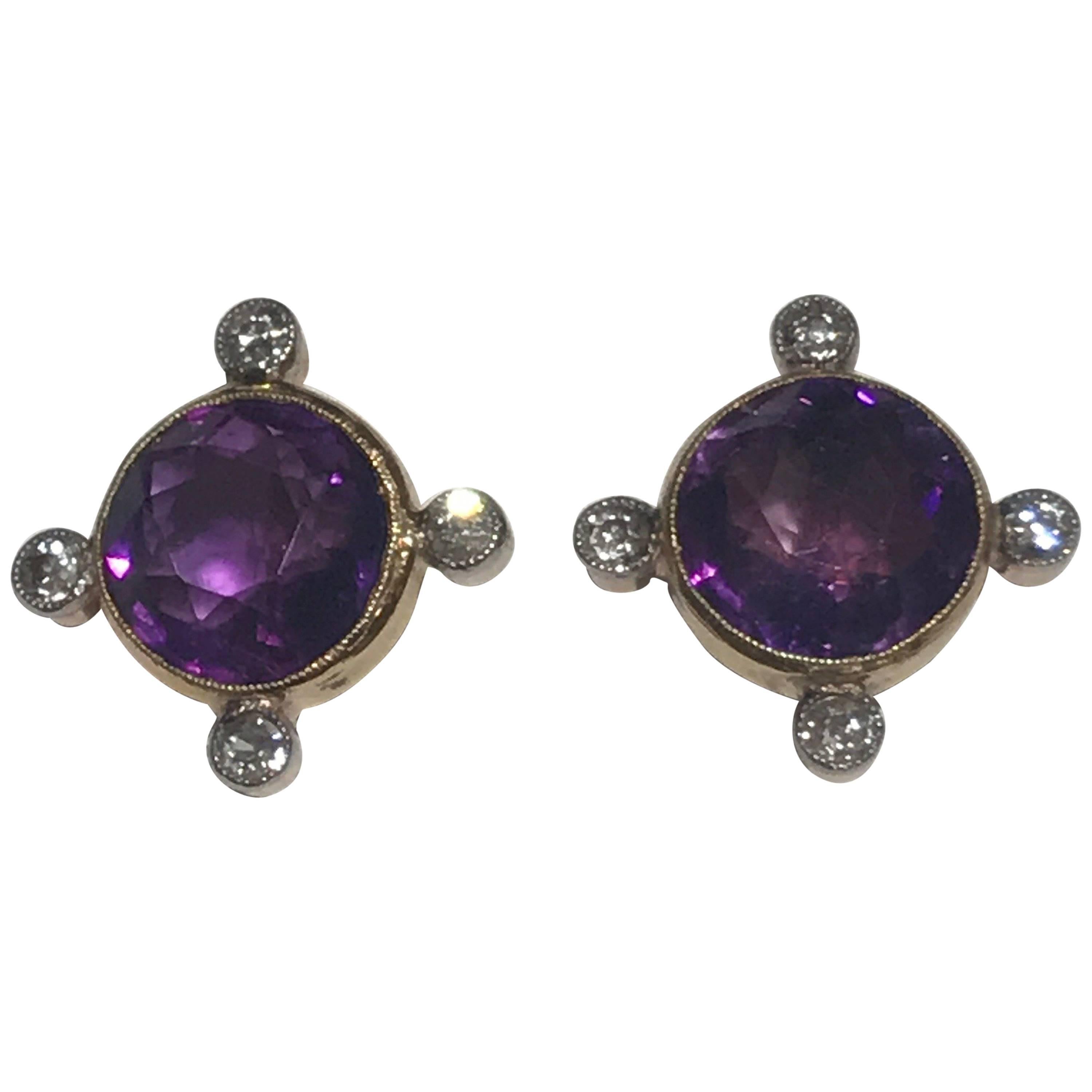 A pair of antique amethyst and old cut diamond earrings, previously were screw backs, however they have been converted for pierced ears.  They were previously marked for 9k on the screw backs as can be seen on the additional images. They are fairly