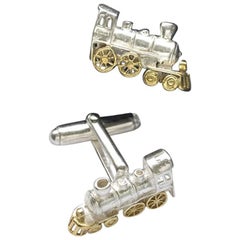 Train Cufflinks in Sterling Silver and 18 Karat Gold Vermeil.