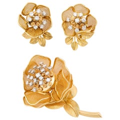 Gold and Diamond "Rose" Brooch and Earrings En Tramblant Centers