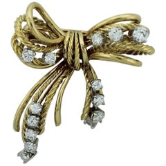 Retro 18 Karat Diamond Bow Brooch, circa 1950s