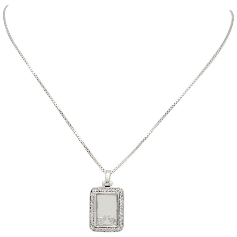 14 Karat White Gold Floating Diamond Rectangle Pendant Necklace For