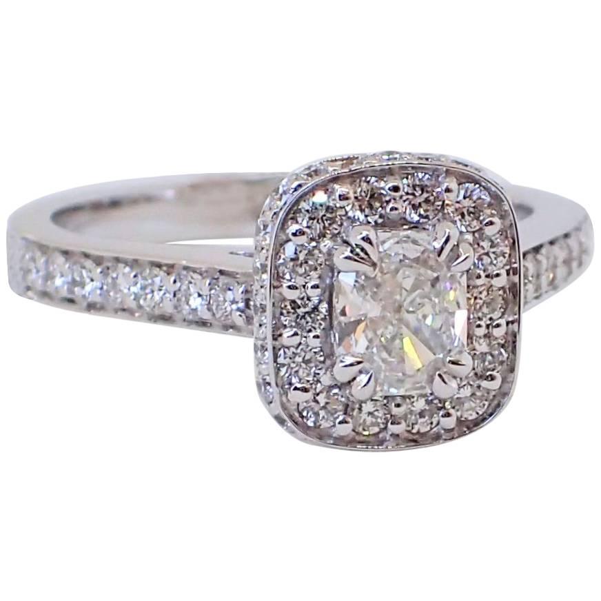 0.81 Carats of Diamond - 18k White Gold Radiant Cut Engagement Ring with Halo For Sale