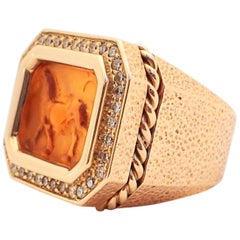 14 Karat Gold Hammered Texture Amber Intaglio Ring with 0.63 Carat of Diamond