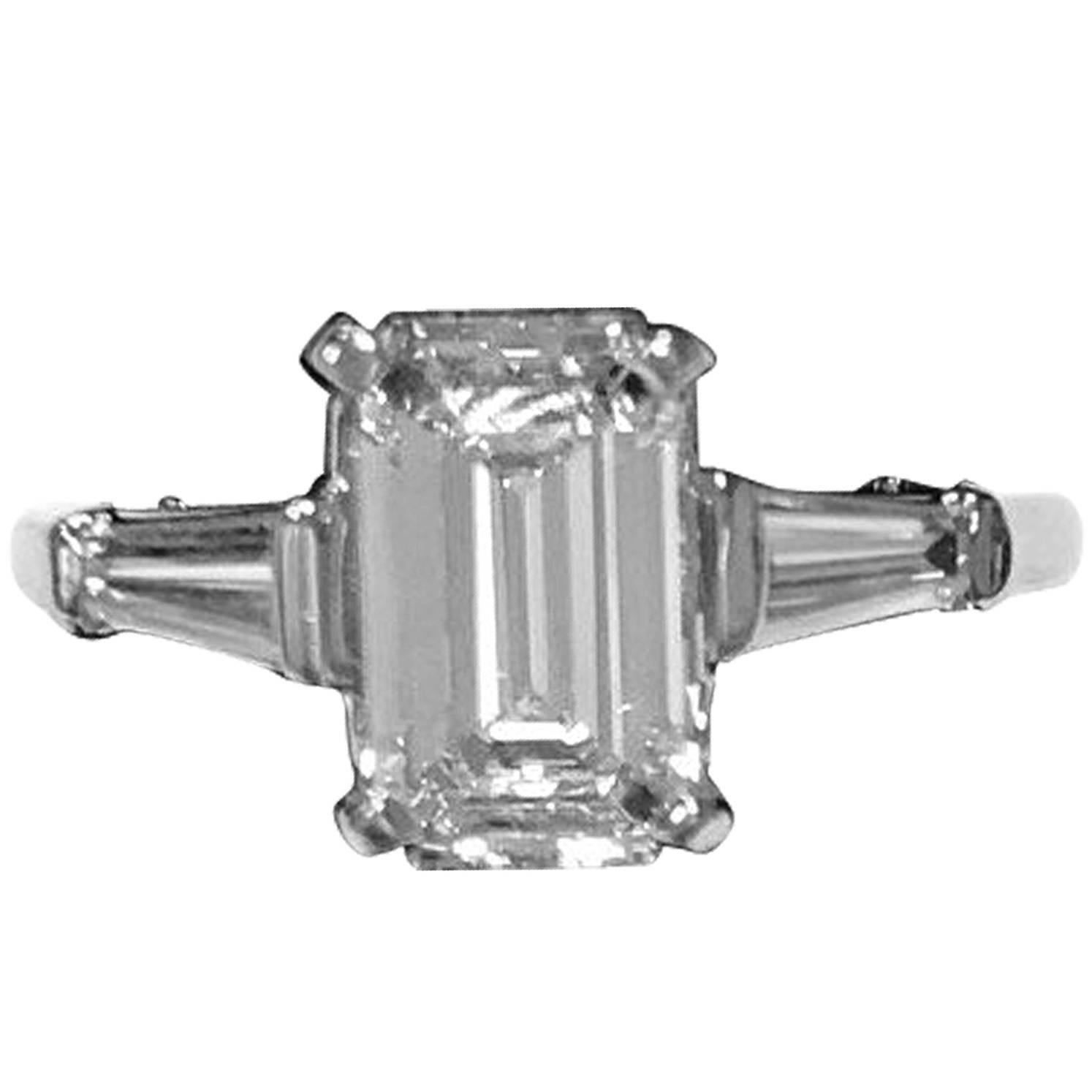 GIA Certified 1.50 Emerald Cut Diamond E/VS1 Platinum Baguette Ring For Sale