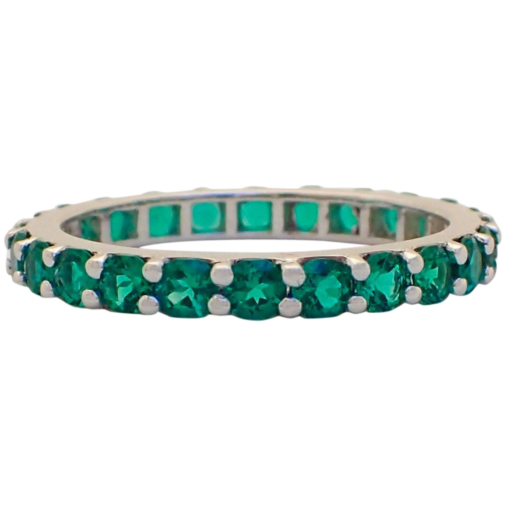 18 Karat Gold Eternity Band with Chatham-Created Emeralds Weighing 1.22 Carat