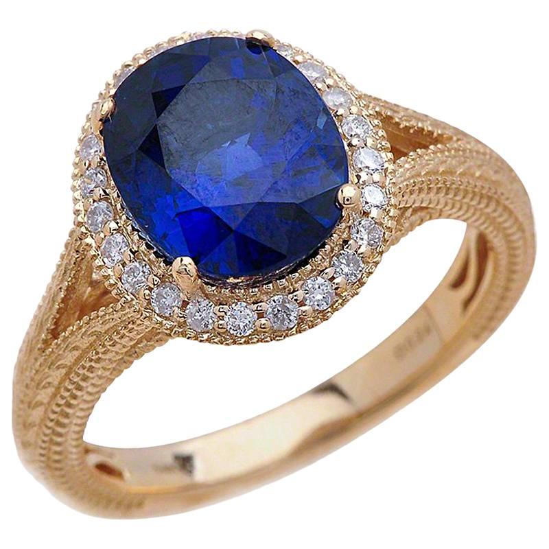 1.50 Carat Oval Cut Blue Sapphire Engagement Ring in 14 Karat Yellow Gold For Sale