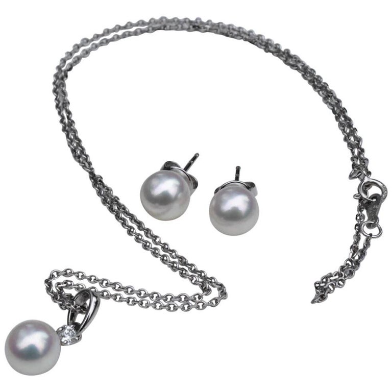 Mikimoto Triple Strand Pearl Necklace with Diamond Flower at 1stdibs