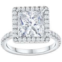 Anillo de compromiso pavé de diamantes talla princesa de 4,07 quilates certificado por el GIA