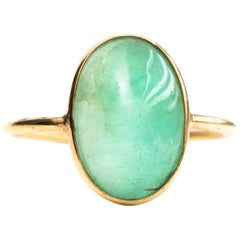 3 Carat Oval Emerald Cabochon and 18 Karat Yellow Gold Ring