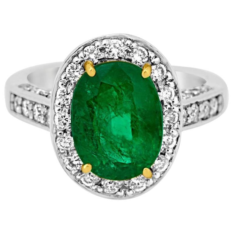 Emerald Diamond Halo Platinum Ring