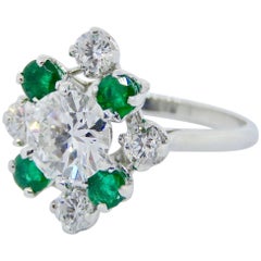 Platinum Diamond and Emerald Estate "Mellerio" Ring