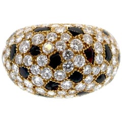 Retro Cartier 18 Karat Gold Onyx Diamond Panther Bombe Ring