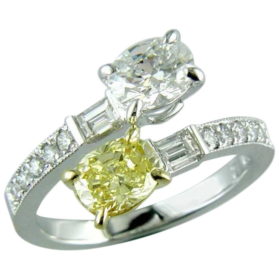 One Fancy Platinum Swirl Yellow and White Oval Diamond Ring For Sale
