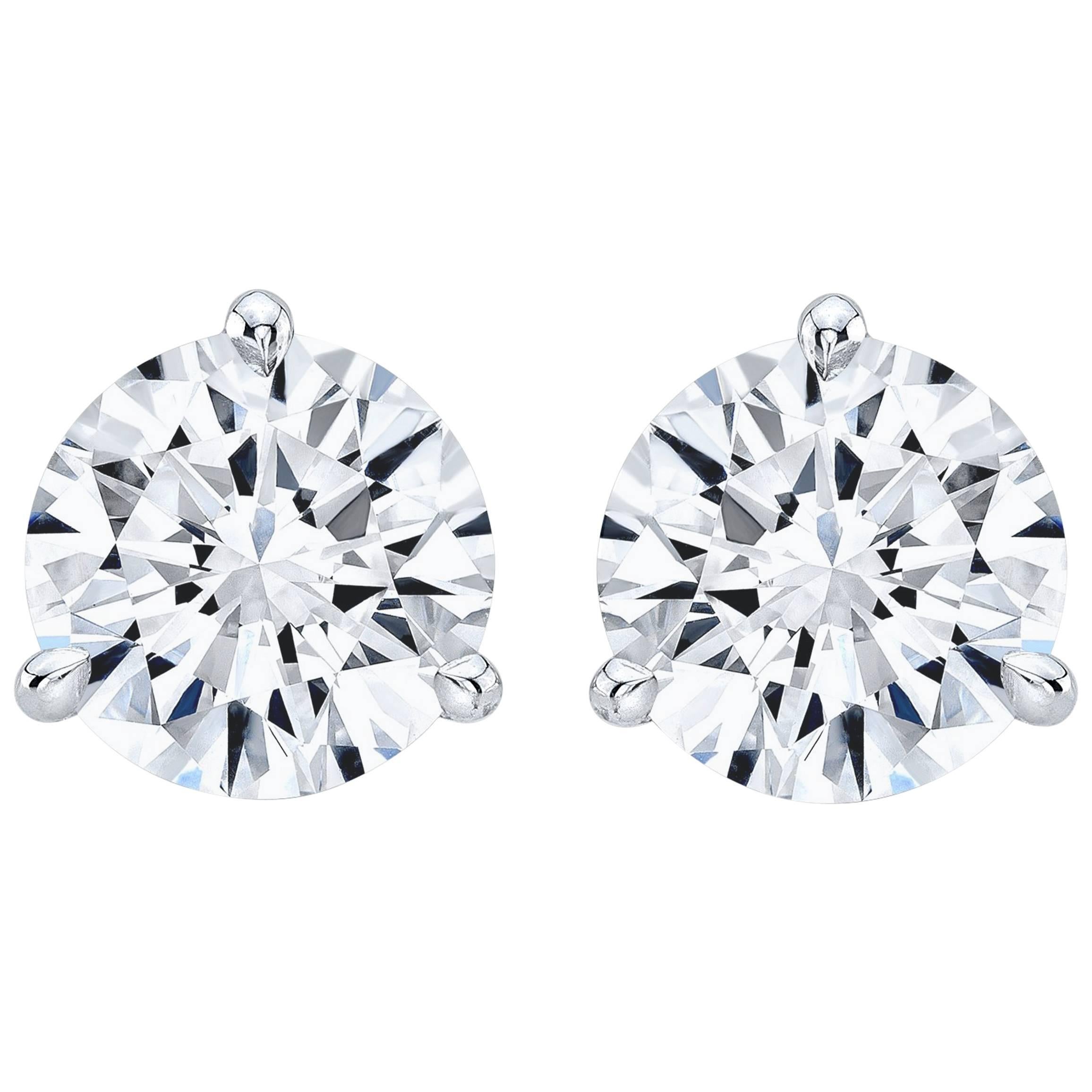 GIA Certified 7.02 Carat TW F VS2 Round Diamond Stud Earrings For Sale