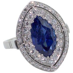 Exceptional 1960s Platinum Marquise-Cut Sapphire & Diamond Ring – 5.10ct Center