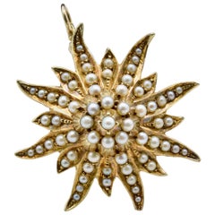 Antique Victorian Natural Fine Seed Pearl Pendant in Yellow Gold in a Sun Star Fashion