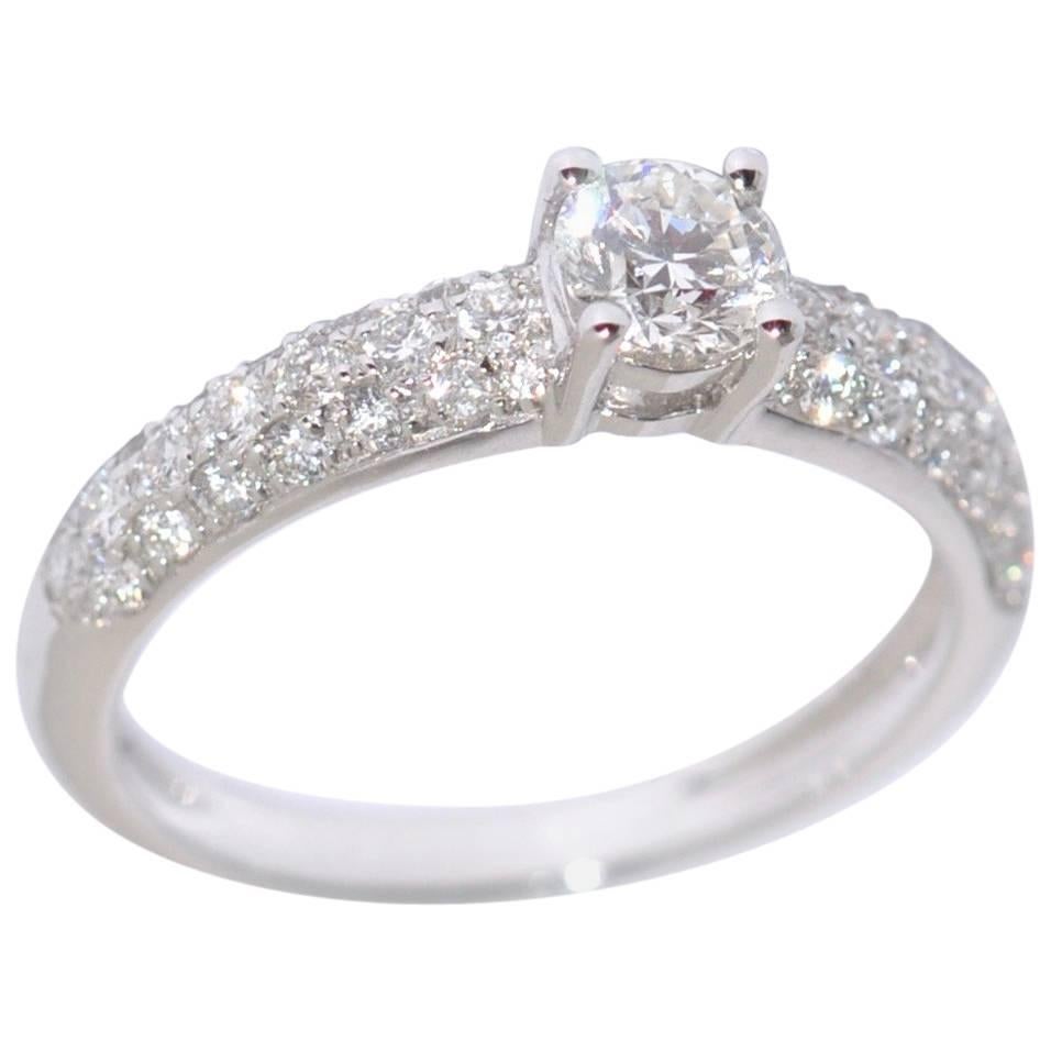 White Diamonds and 18 Carats White Gold Engagement Ring