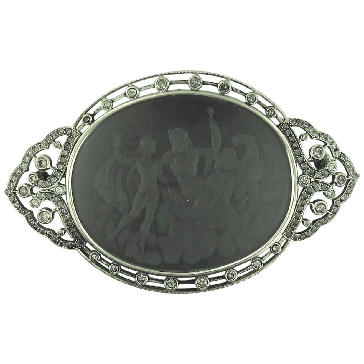 Signed "Putti" Platinum Black Onyx Brooch or Pendant, circa 1920