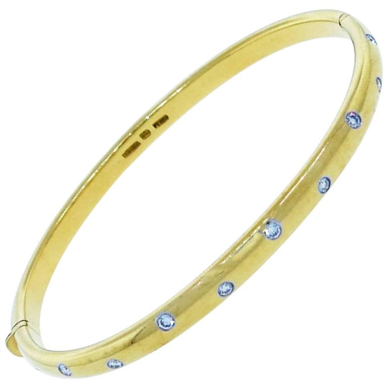 Tiffany and Co. Diamond Gold Platinum Etoile Bangle Bracelet at 1stdibs