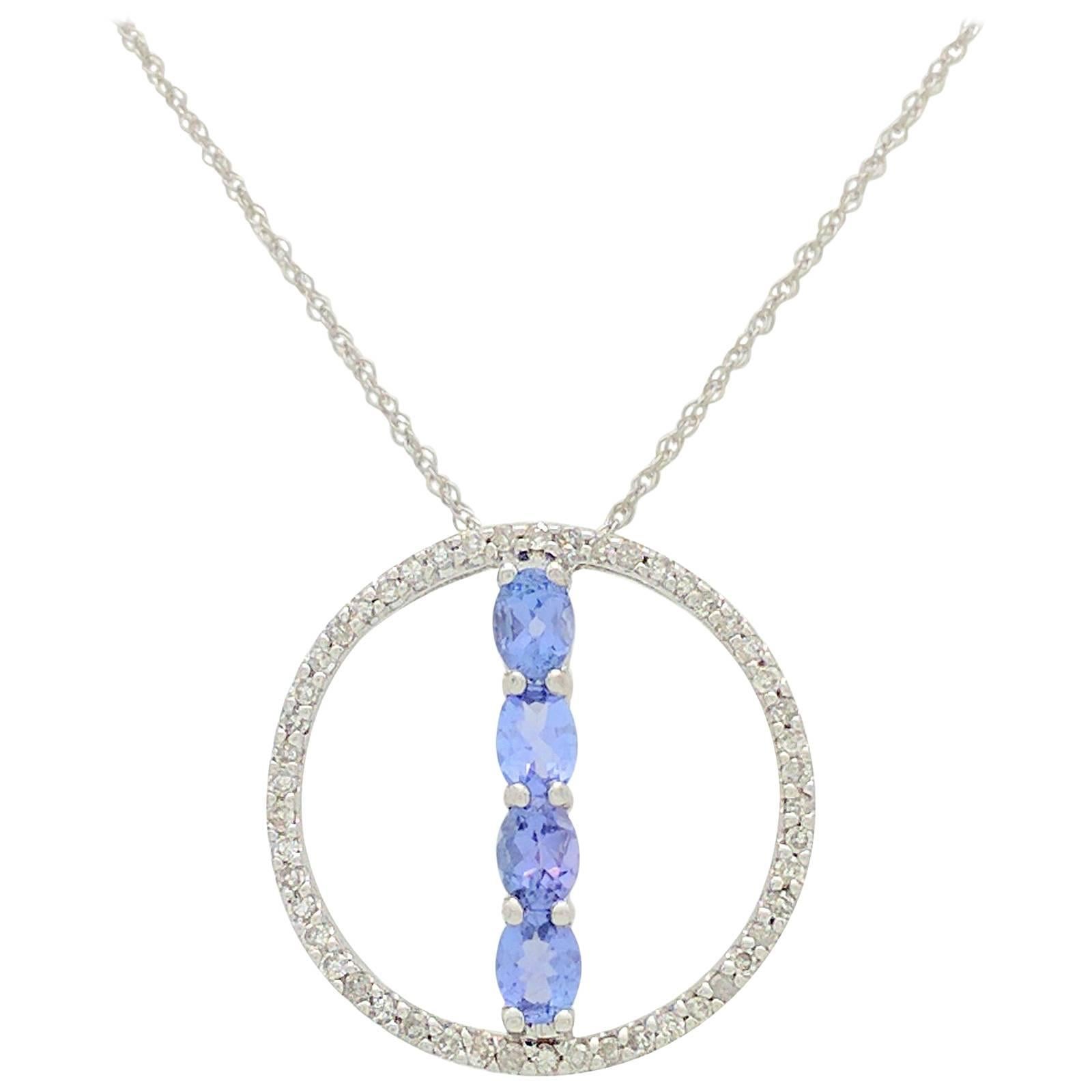 10 Karat White Gold .85 Carat Tanzanite and Diamond Pendant Necklace 2 Grams