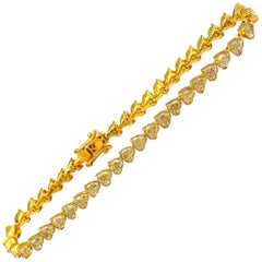 9.47 Carat 44 Heart Shaped Fancy Light Yellow Diamonds Bracelet in 18 Karat Gold