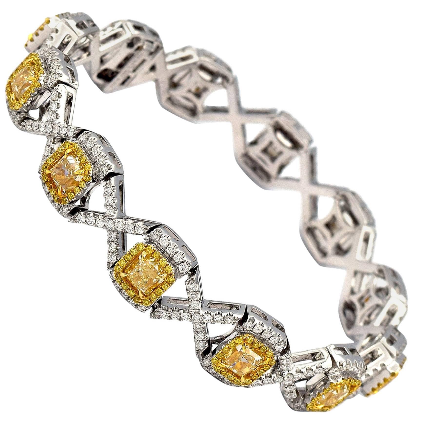10.36 Carat 12 Radiant Fancy Yellow Diamonds in 18 Karat Yellow Gold Bracelet For Sale