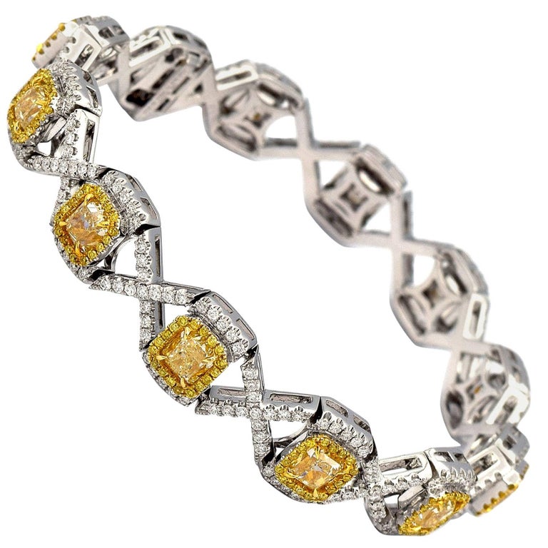 10.36 Carat 12 Radiant Fancy Yellow Diamonds in 18 Karat Yellow Gold