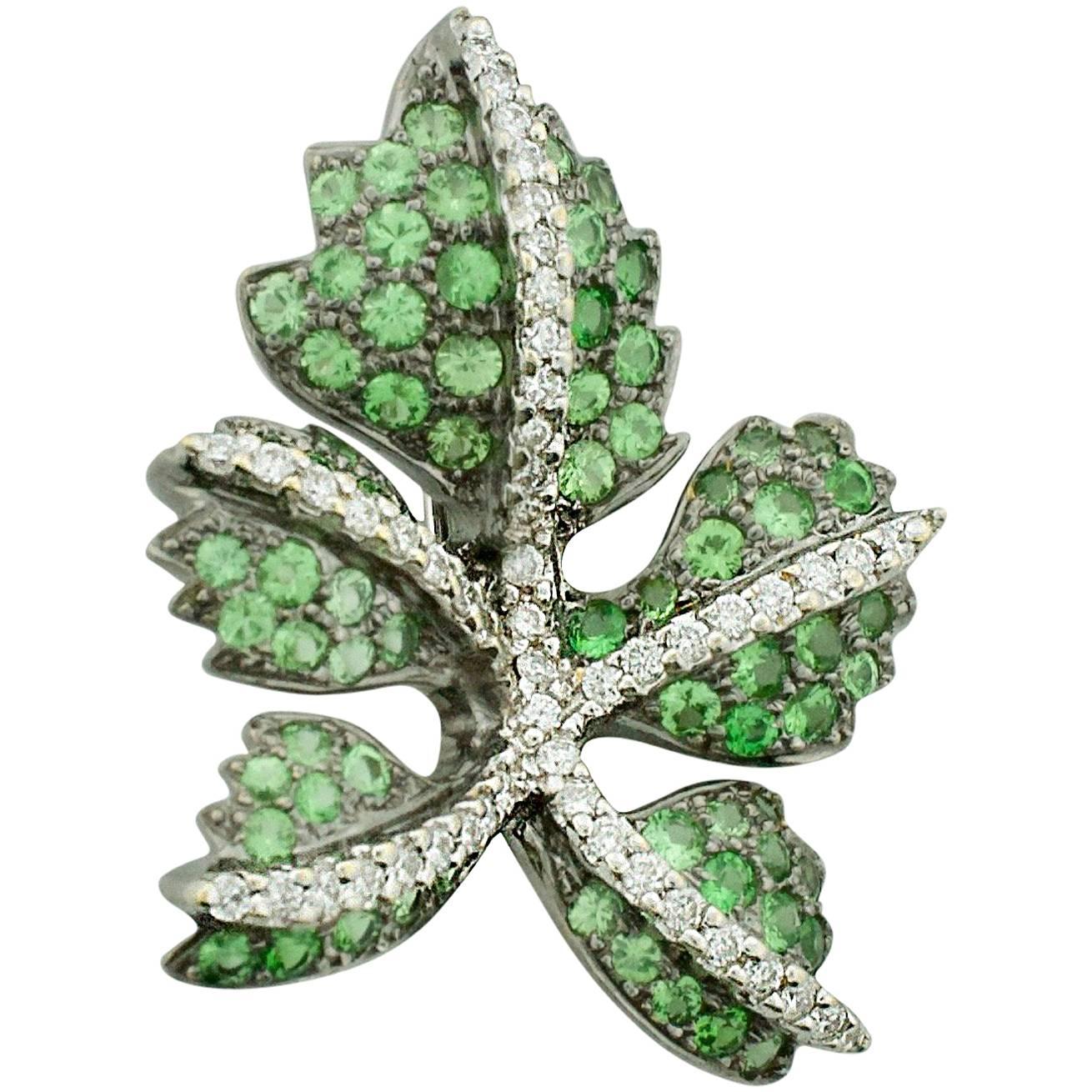 18 Karat Tsavorite Garnet and Diamond Leaf Brooch For Sale