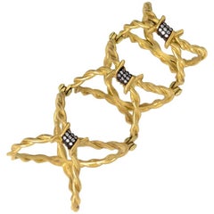 Anello Wendy Brandes con filo spinato a tutto dito in oro giallo 18 carati, accenti di diamanti