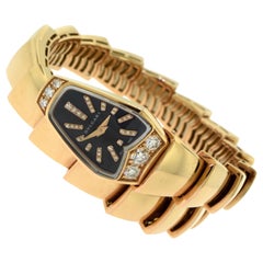Bvlgari Serpenti Jewelry 18 Karat Rose Gold Diamond and Sapphire Watch