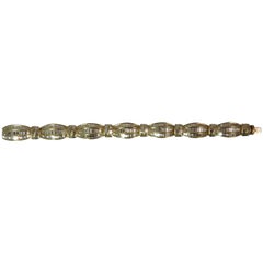 18 Karat Yellow Gold Flexible Bracelet with Baguette Diamonds