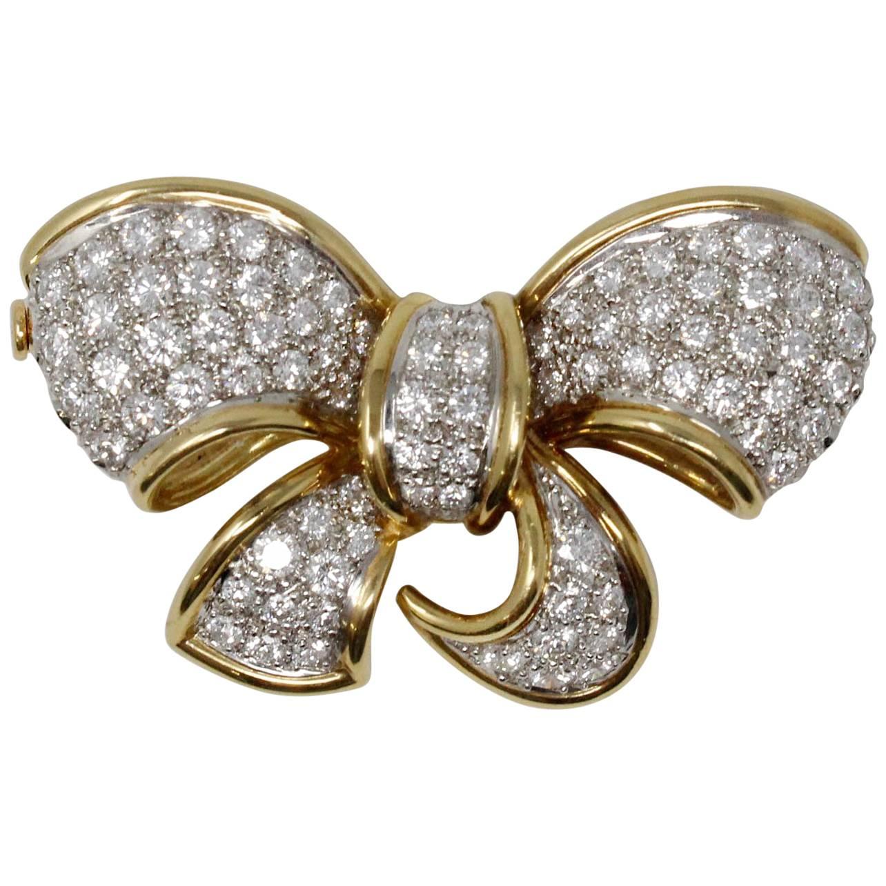 18 Karat Yellow Gold and Platinum Bow Pin with Diamonds For Sale