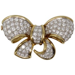 18 Karat Yellow Gold and Platinum Bow Pin with Diamonds