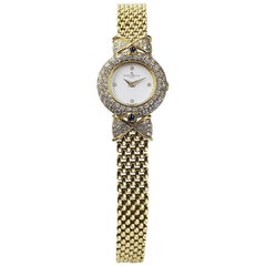 Baume & Mercier Ladies Yellow Gold Diamond Dress Quartz Wristwatch