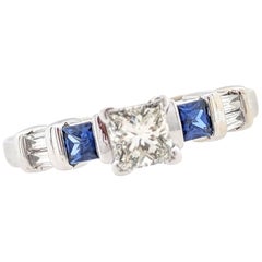 10 Karat White Gold .63 Carat Diamond and Sapphire Engagement Ring