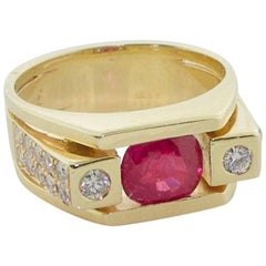 Anillo de rubíes y diamantes de Birmania en oro amarillo de 14 quilates