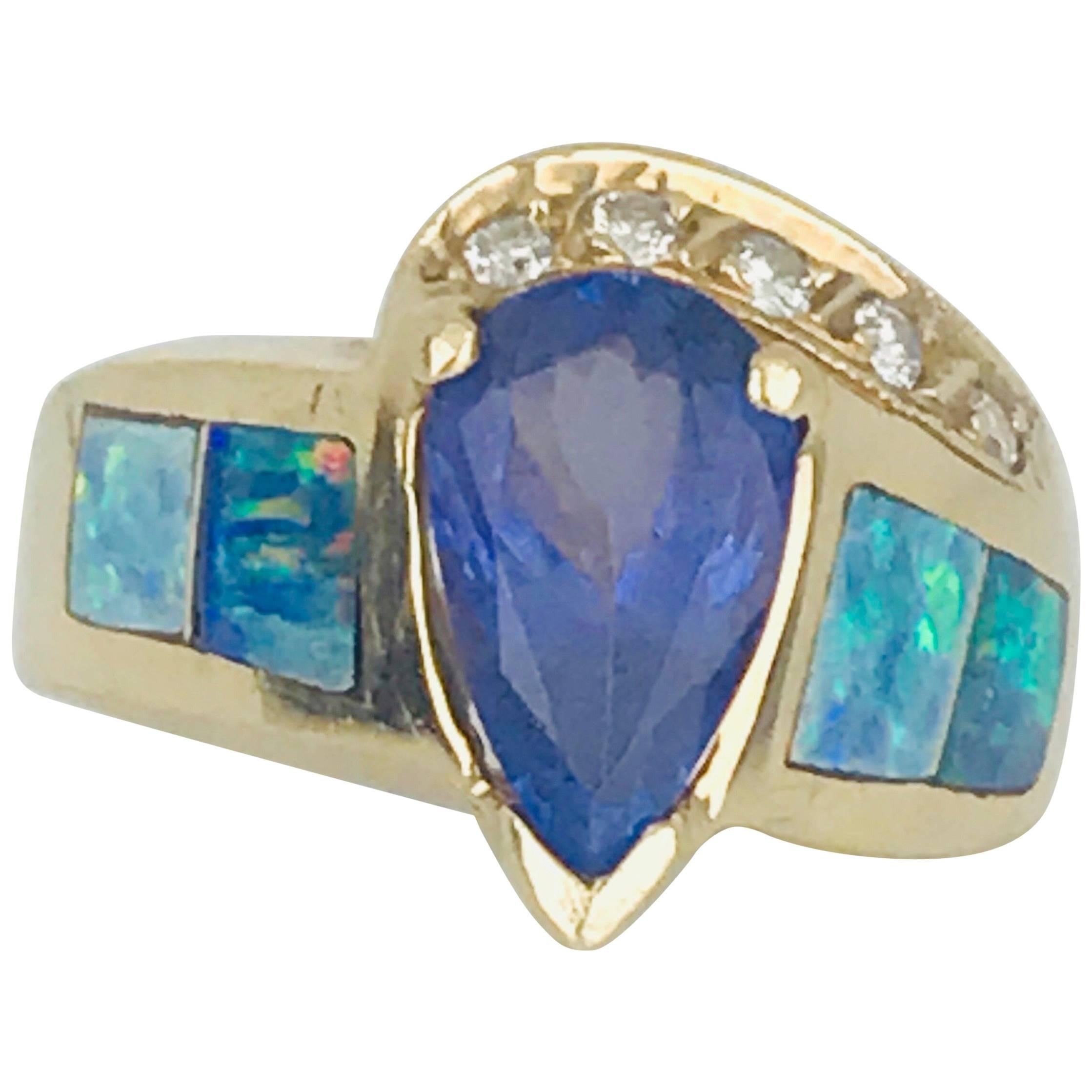 Tanzanite Pear Shaped Ring, Set with Australian Opal and Diamond, circa 1985 For Sale