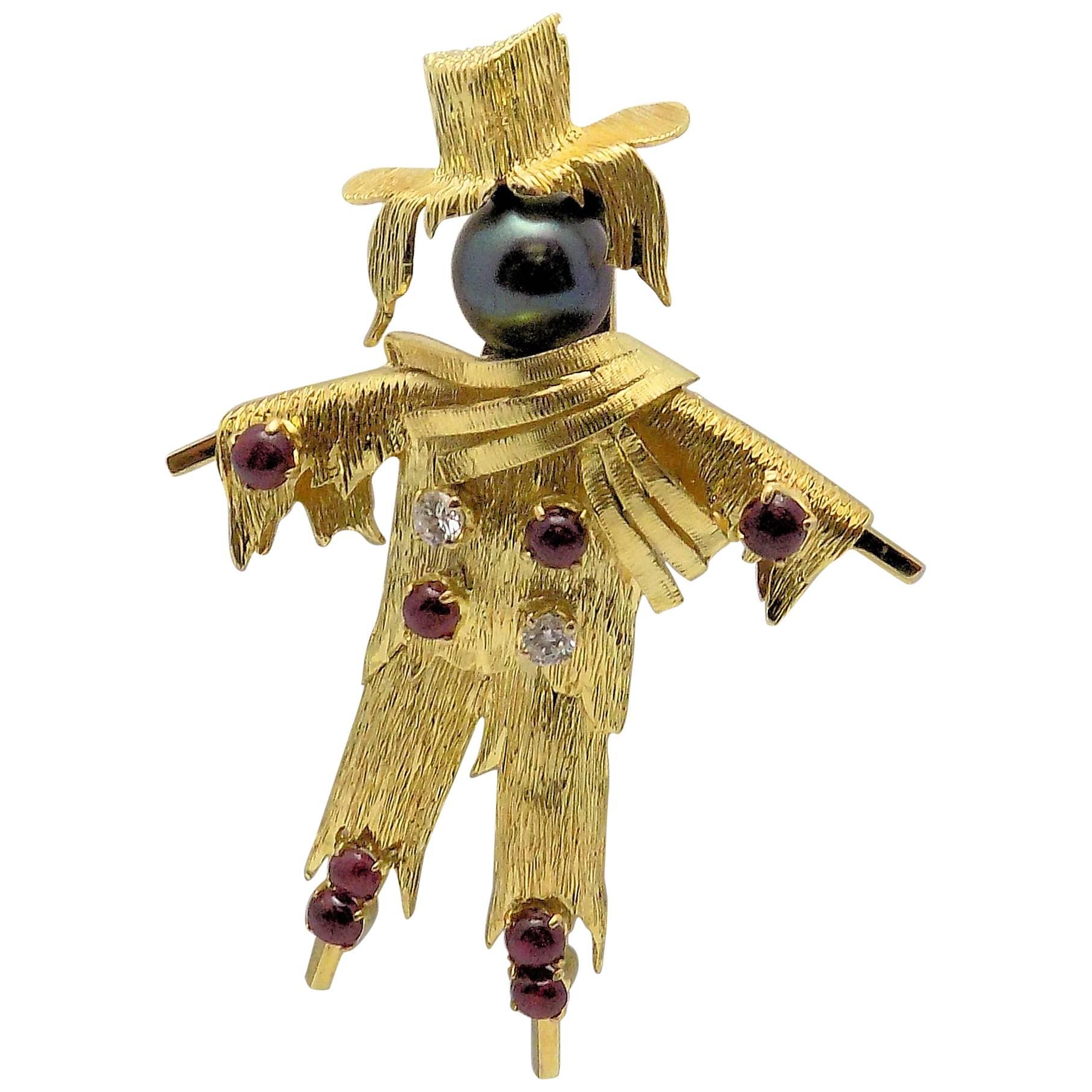 14 Karat Yellow Gold Scarecrow Brooch Has Black Cultured Pearl; Diamonds; Rubies