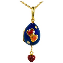 Faberge by Victor Mayer 18 Karat and Enamel Diamond Egg Locket Pendant