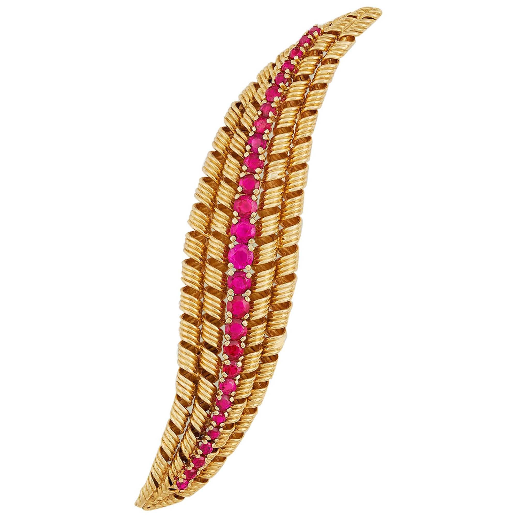 1960s Graduated Ruby and 18 Karat Yellow Gold Brooch by Tiffany & Co. For Sale