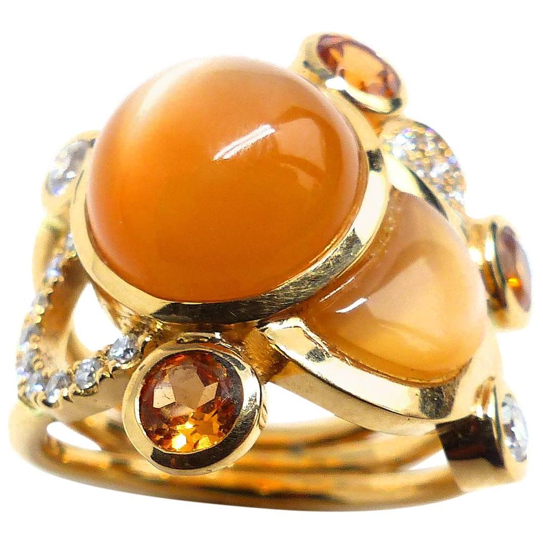 Leyser Bague "Raindance" en or rose 18 carats, pierre de lune, grenat mandarin et diamants en vente