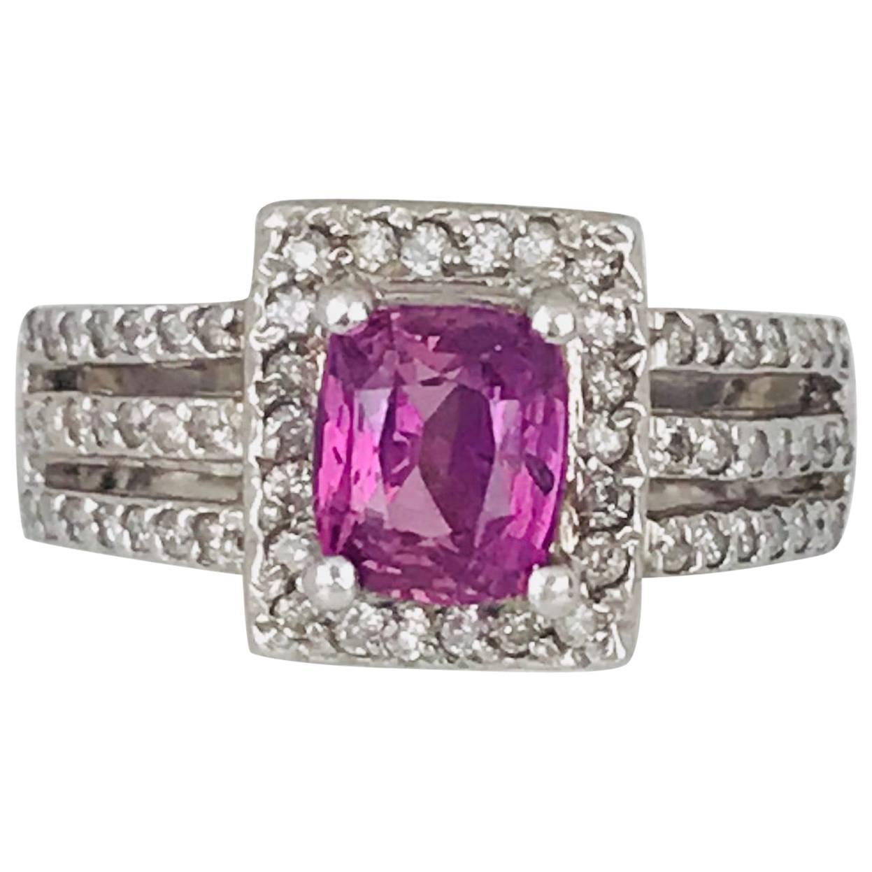 1.36 Carat, Cushion Cut, Pink Sapphire and Diamond Halo 14 Karat White Gold Ring For Sale