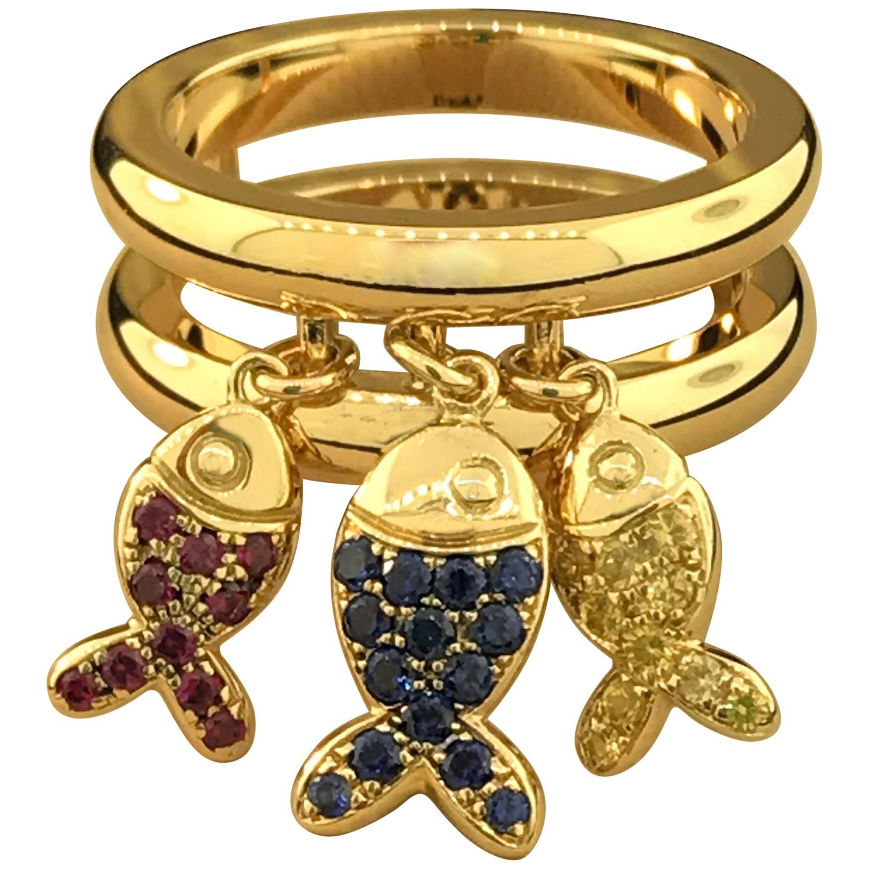 Chopard 18 Karat Yellow Gold Rubies and Sapphires Fish Ring For Sale