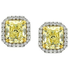 Mark Broumand 3.86 Carat Fancy Yellow Radiant Cut Diamond Halo Earrings