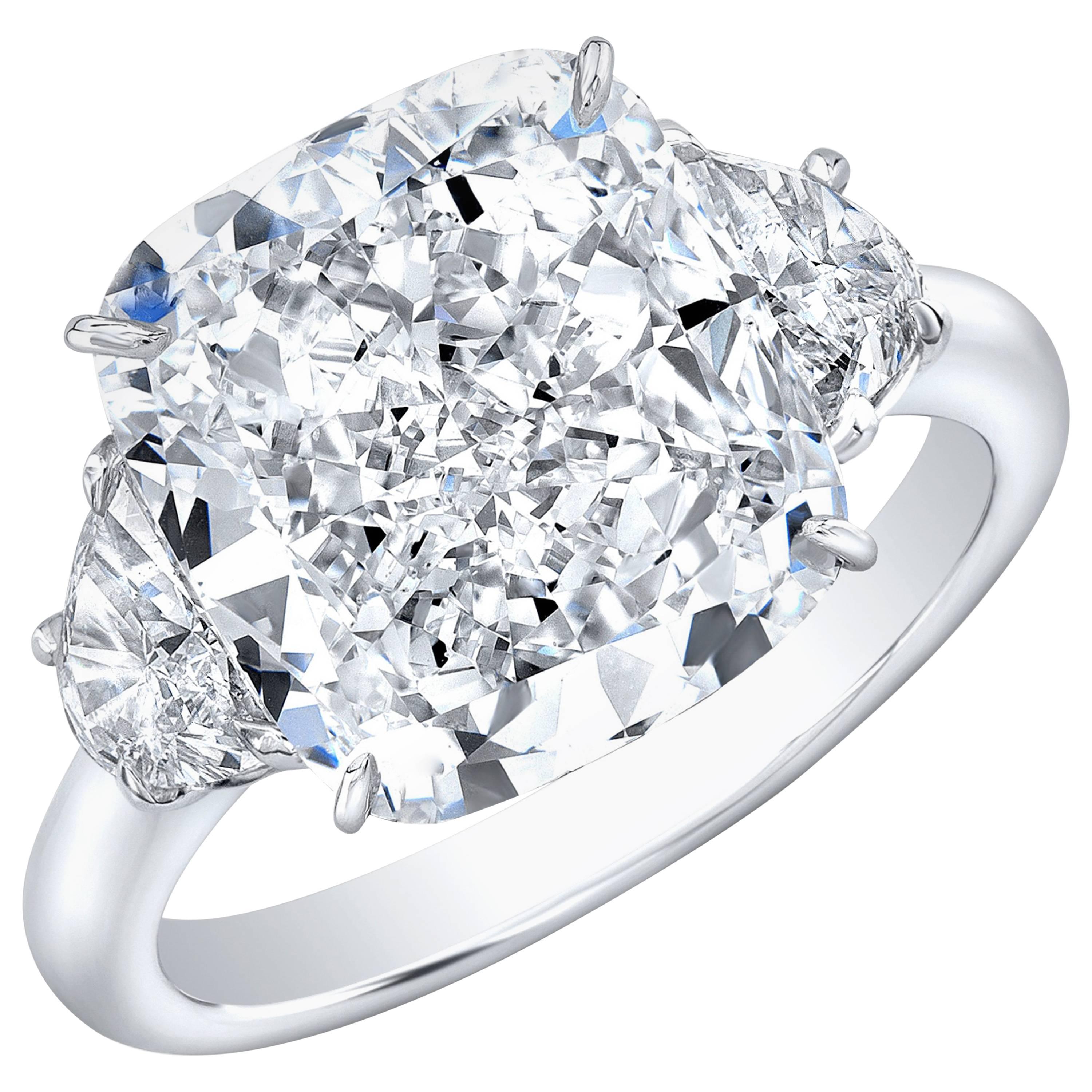 GIA Certified 7.07 Carat J SI1 Cushion Diamond Three-Stone Ring with Half Moons