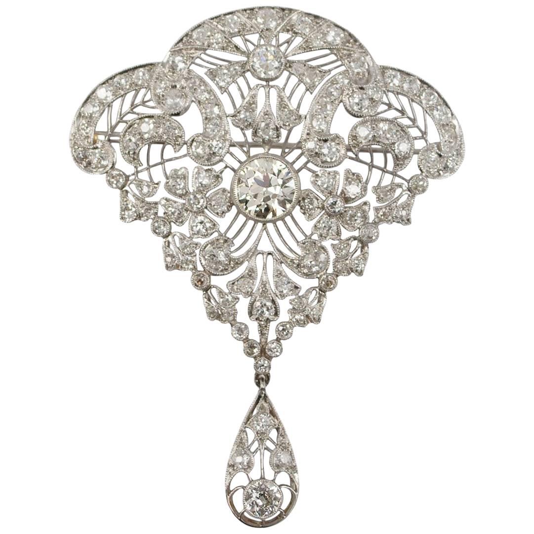Antique Diamond Art Deco Pin with Round Brilliants and Floral Details