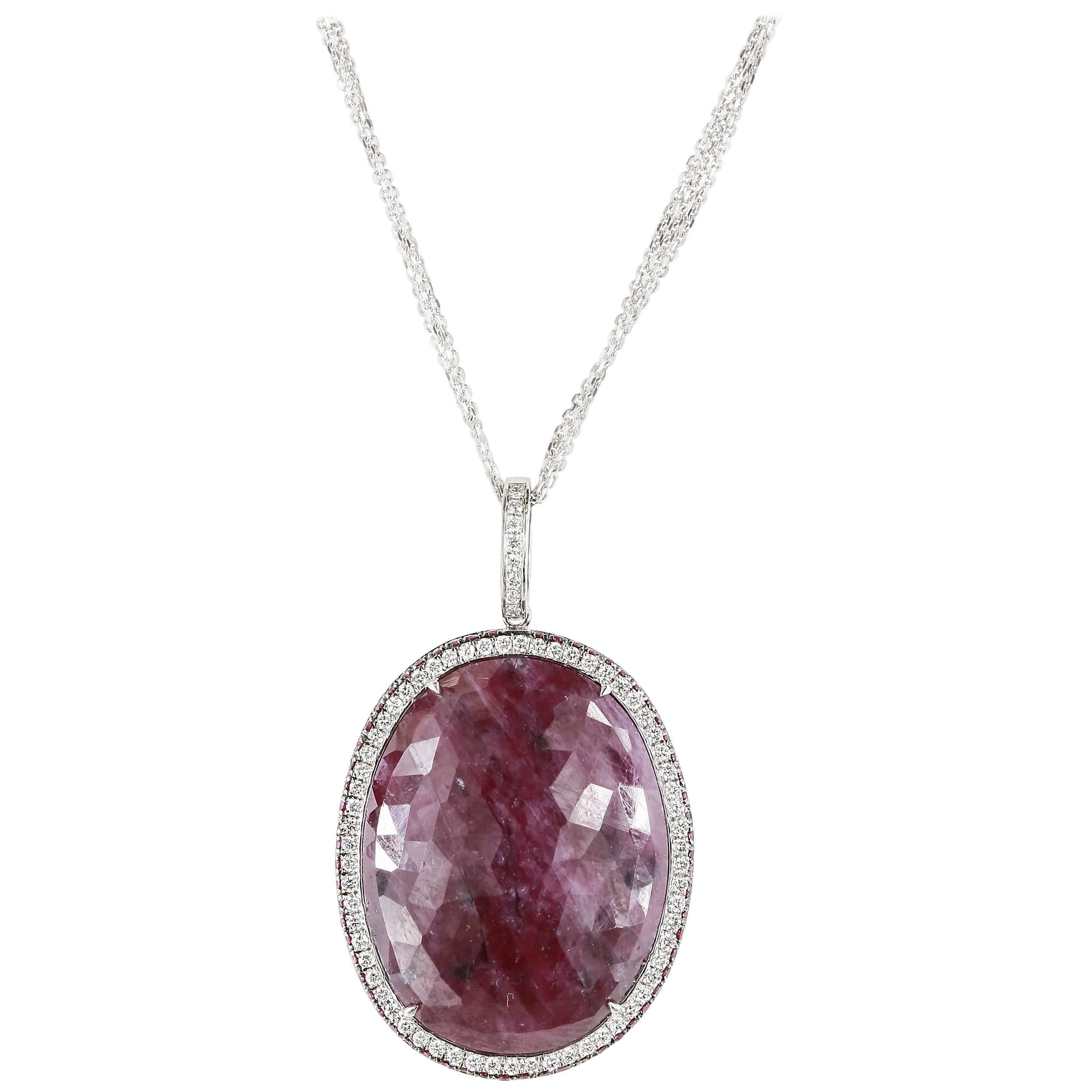 27.28 Carat Oval Ruby Slice Pendant with Diamond and Ruby Halo For Sale