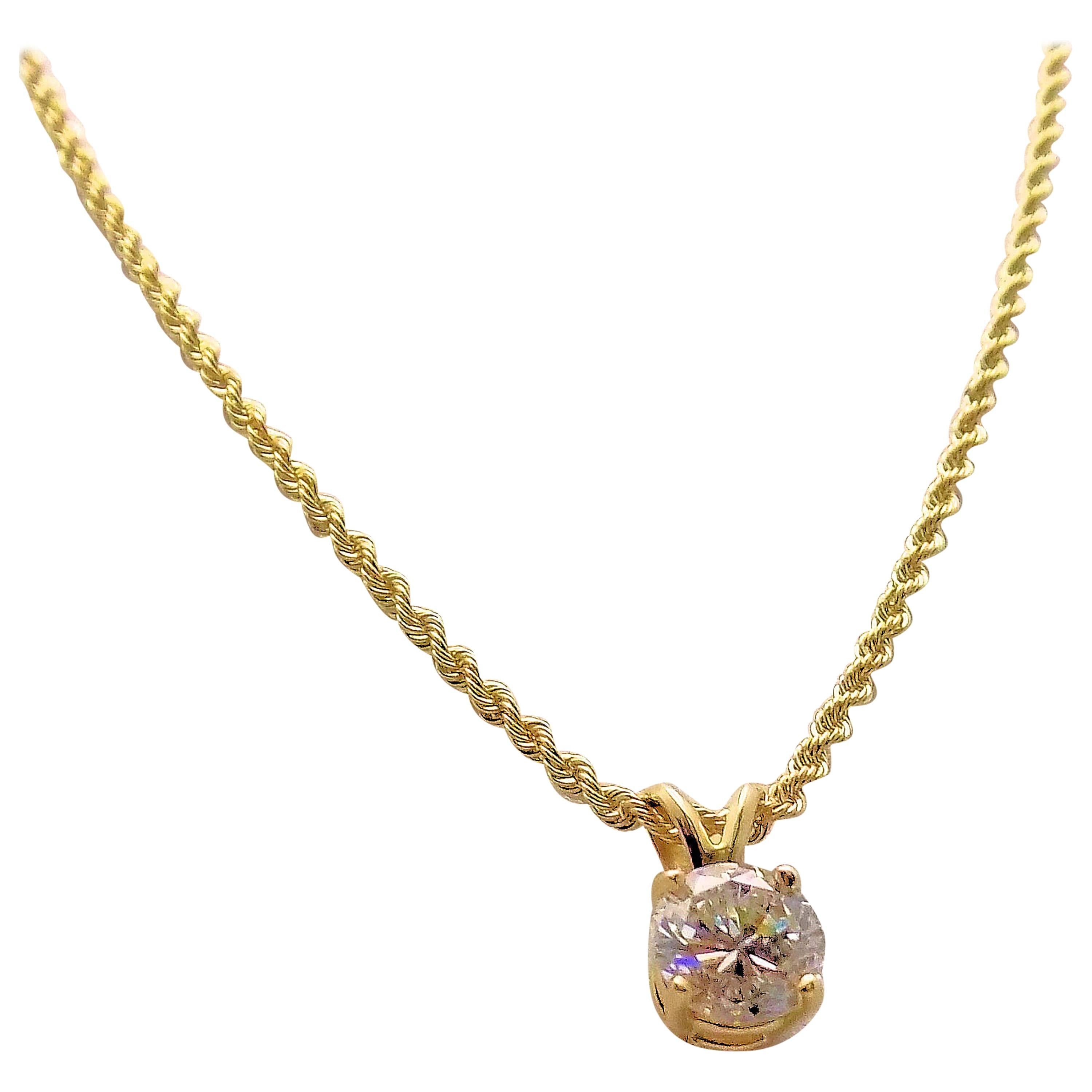Diamond Pendant and 14 Karat Yellow Gold Rope Chain For Sale